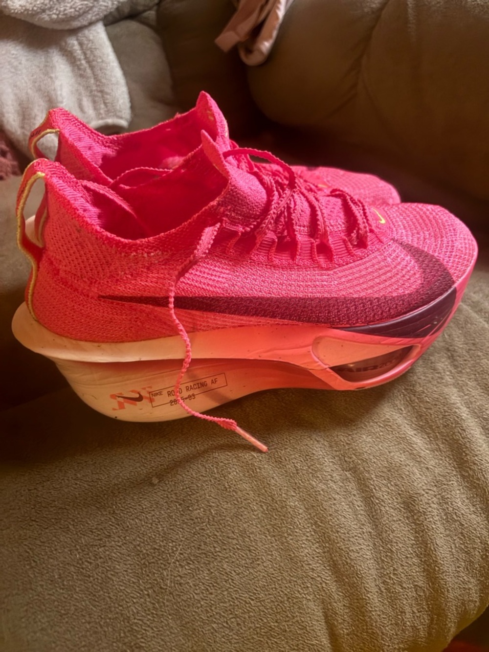 Nike Women's Hot Pink/Coral Flyknit Racing Shoe